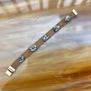 Vintage gold tone metal mesh bracelet with green stone embellishments